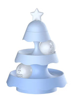 Blue Christmas tree-shaped night light with star on a white background