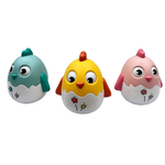 Three colorful chicken-shaped toys with different colors and designs on a white background.