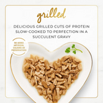 Heart-shaped plate with grilled protein on a white background, text about grilled protein and gravy.