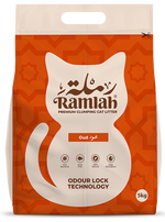 Orange package of Ramlah cat litter with a white cat illustration on a white background