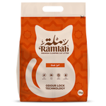 Bag of Ramlah cat litter with a geometric pattern on an orange background