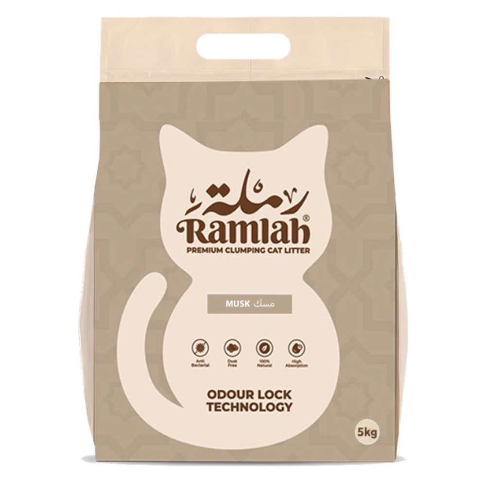 Bag of Ramlah cat litter with a cat illustration on a beige background