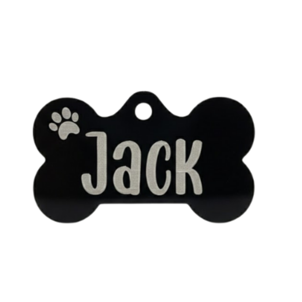 Black bone-shaped pet tag with 'Jack' engraved on a white background