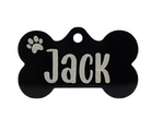 Black bone-shaped pet tag with 'Jack' engraved on a white background