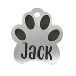 Silver paw-shaped pet tag with 'Jack' engraved on a white background