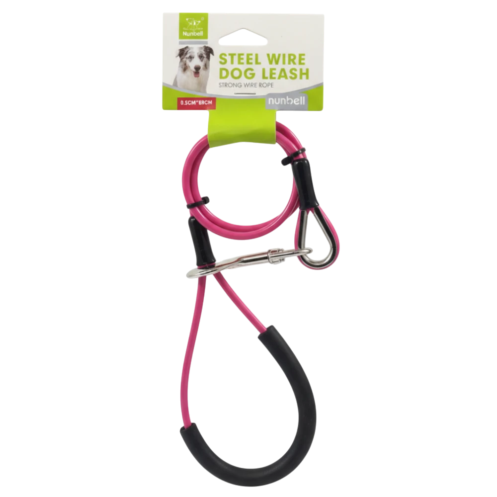 Pink dog leash with black handles and clip on a white background, featuring a Ruffwear brand tag.