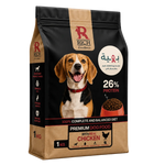 A 1 kg bag of Rich Excellence Premium Dog Food with Real Chicken, featuring a black and tan design with a photo of a happy beagle dog on the front.