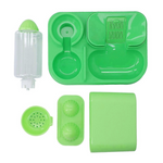 Set of green silicone kitchen tools on a white background