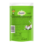 Green package of Dreamies cat treats with text and a cat illustration on a white background
