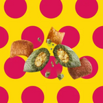 Fried food items on a yellow background with pink polka dots