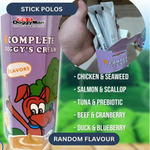 DoggyMan Complete Doggy's Cream packaging with a hand holding a box of stick polos.