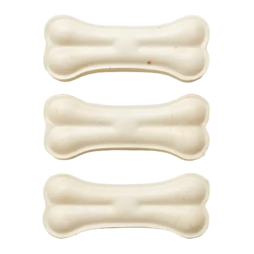 Three bone-shaped dog toys on a white background
