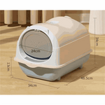 Beige cat litter box with dimensions on a wooden floor