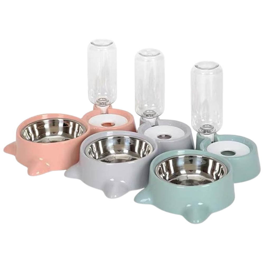 Set of pet bowls in pink, gray, and green with glass water bottles on a white background