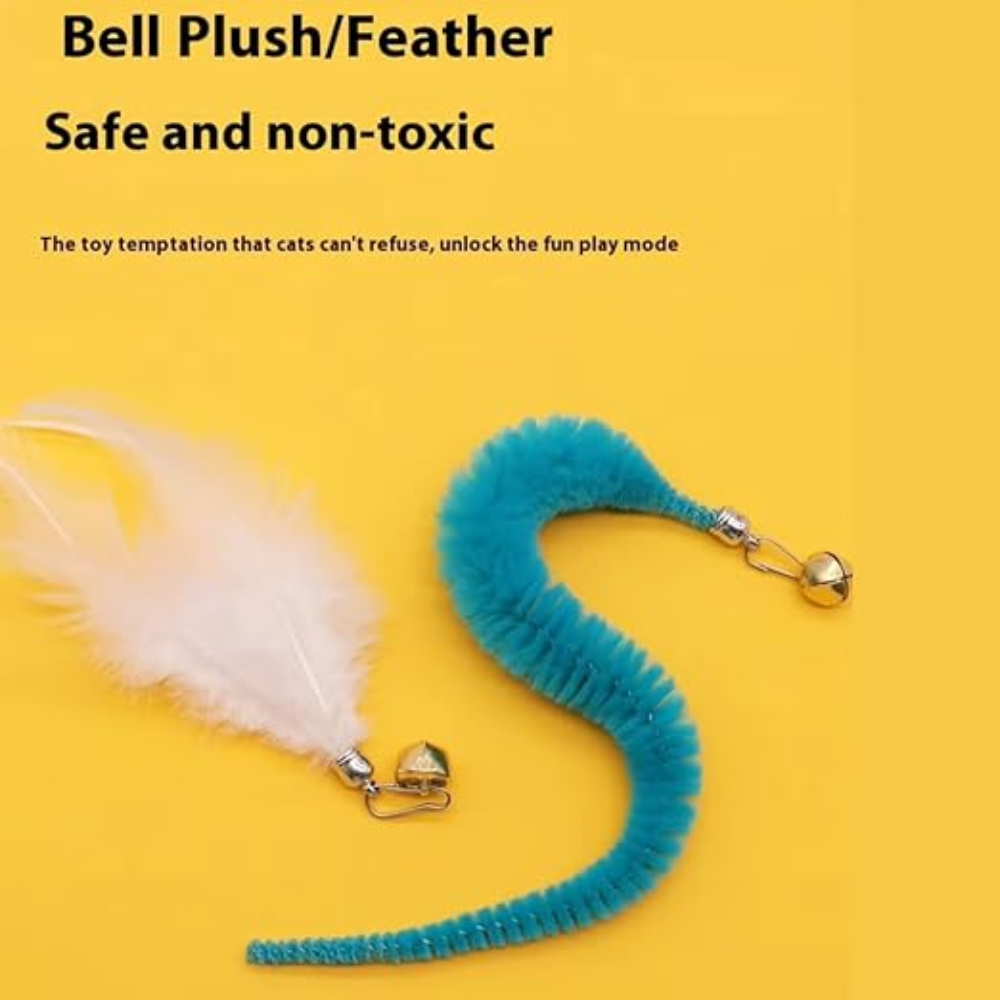Cat toy with feather and bell on a yellow background