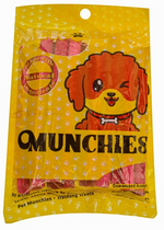 Yellow package of 'Munchies' dog treats with a cartoon dog illustration on a white background.