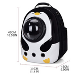 Pet carrier with penguin design and measurements on a white background