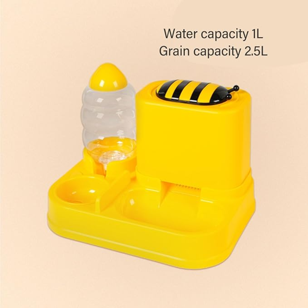 Yellow animal-shaped feeder with water and grain compartments on a beige background