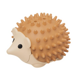 Hedgehog-shaped toy with spiky texture on a white background