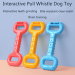 Three colorful dog toys (red, yellow, blue) on a pink surface with a light blue background.