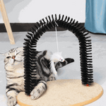 Cat playing with a black arch-shaped pet toy with a dangling white mouse on a light gray floor.