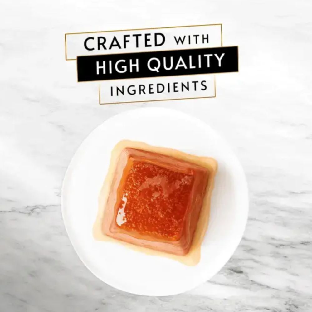 Square of amber-colored soap on a white plate with 'Crafted with High Quality Ingredients' text above.