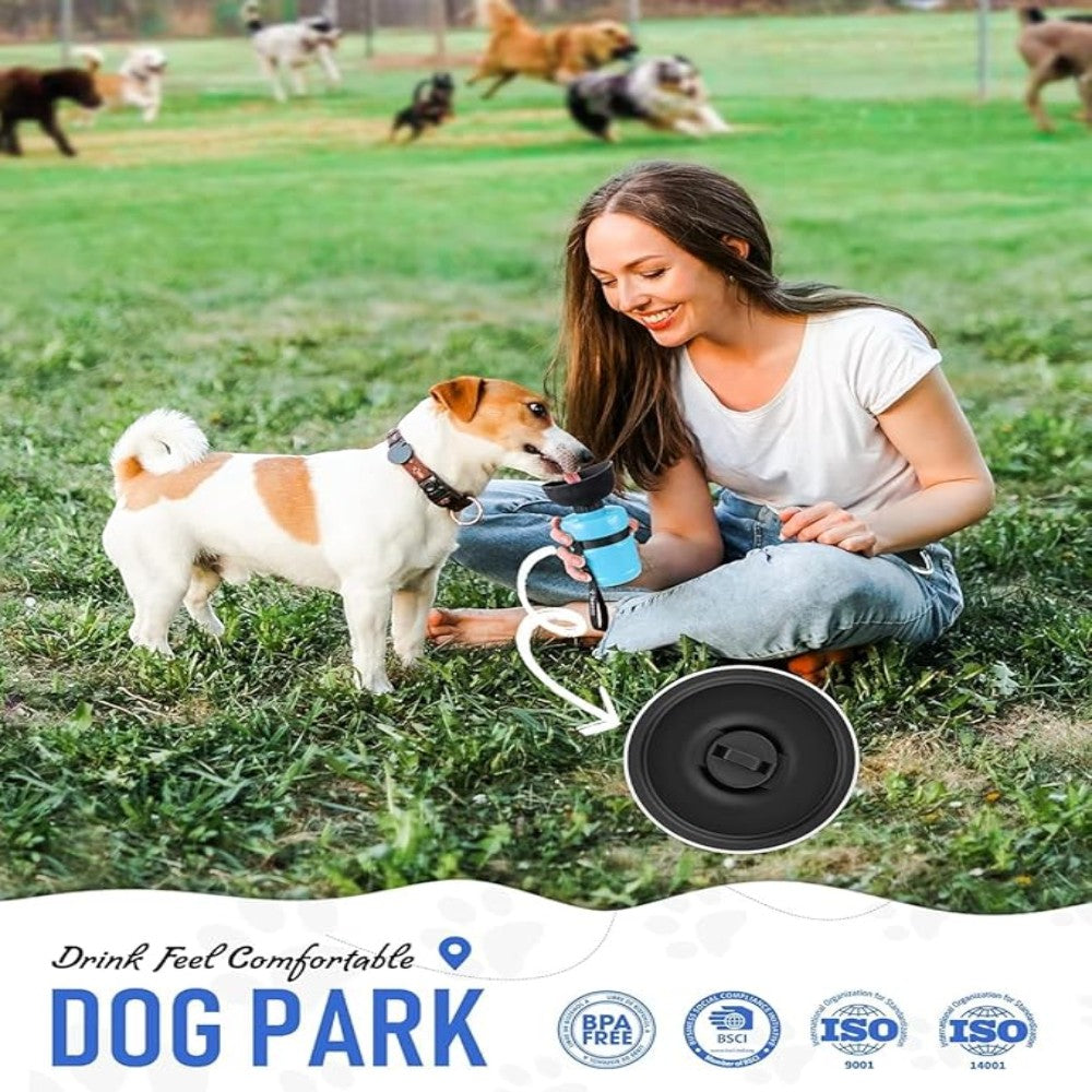 Woman sitting on grass with a dog, both drinking from a blue water bottle, with 'Dog Park' branding.