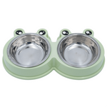 Double stainless steel pet bowl with green plastic holder on a white background