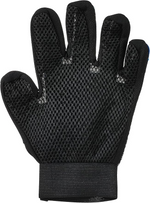 Black glove with textured palm on a white background