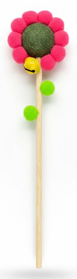 Toy with a flower-shaped top featuring colorful balls on a white background