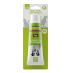 Dog toothpaste with green packaging and white cap on a white background