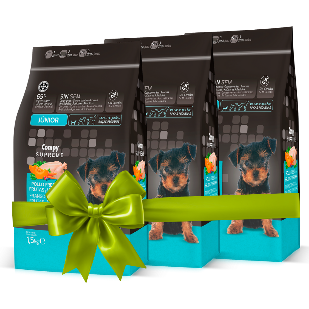 Three packages of dog food with a green bow on a white background