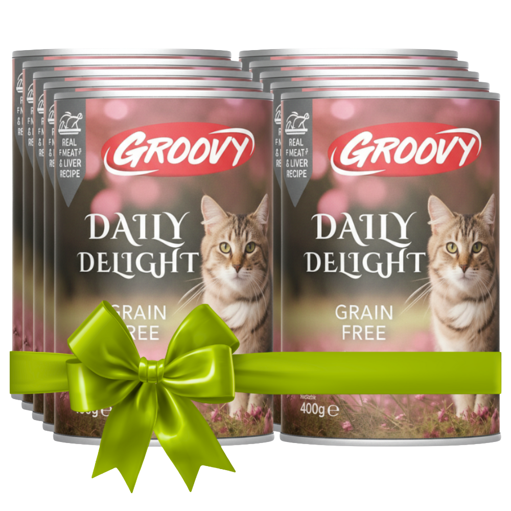 Groovy Daily Delight grain-free cat food cans with a green bow on a white background