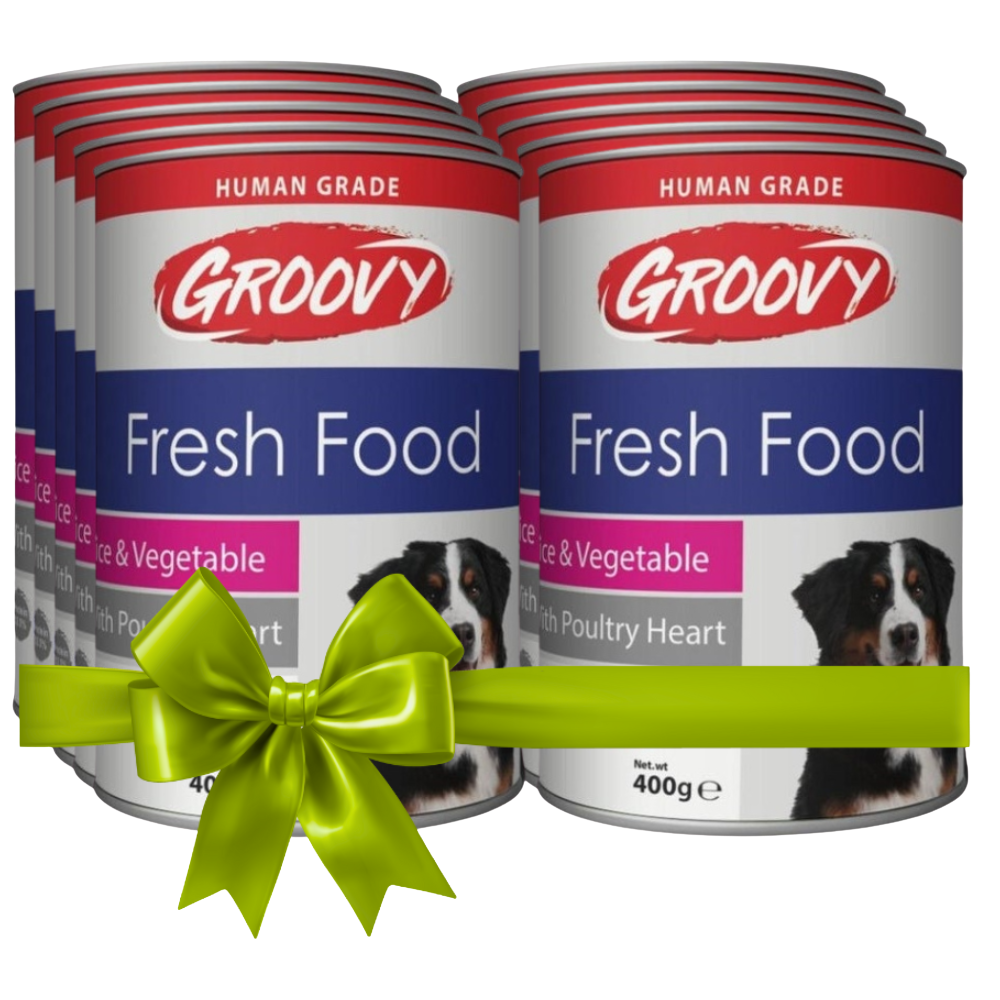 Groovy Fresh Food dog food cans with a green bow on a white background