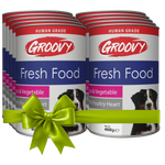 Groovy Fresh Food dog food cans with a green bow on a white background