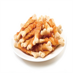 Plate of breadsticks with mushroom-shaped ends on a white background