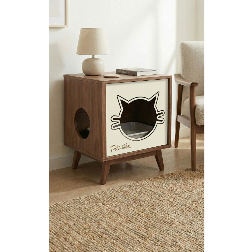 Wooden pet bed with cat face design on a side table in a room.
