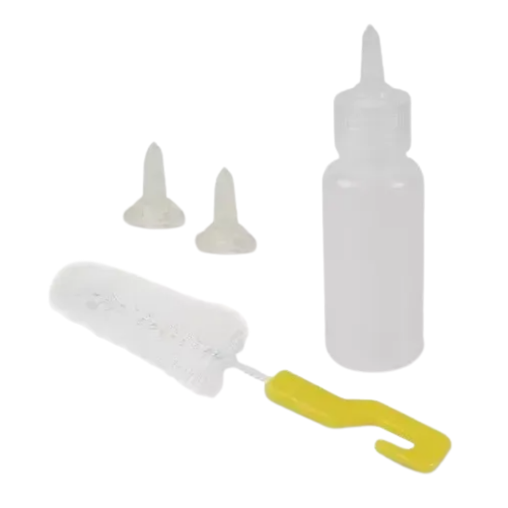 White bottle with yellow handle and attachments on a white background