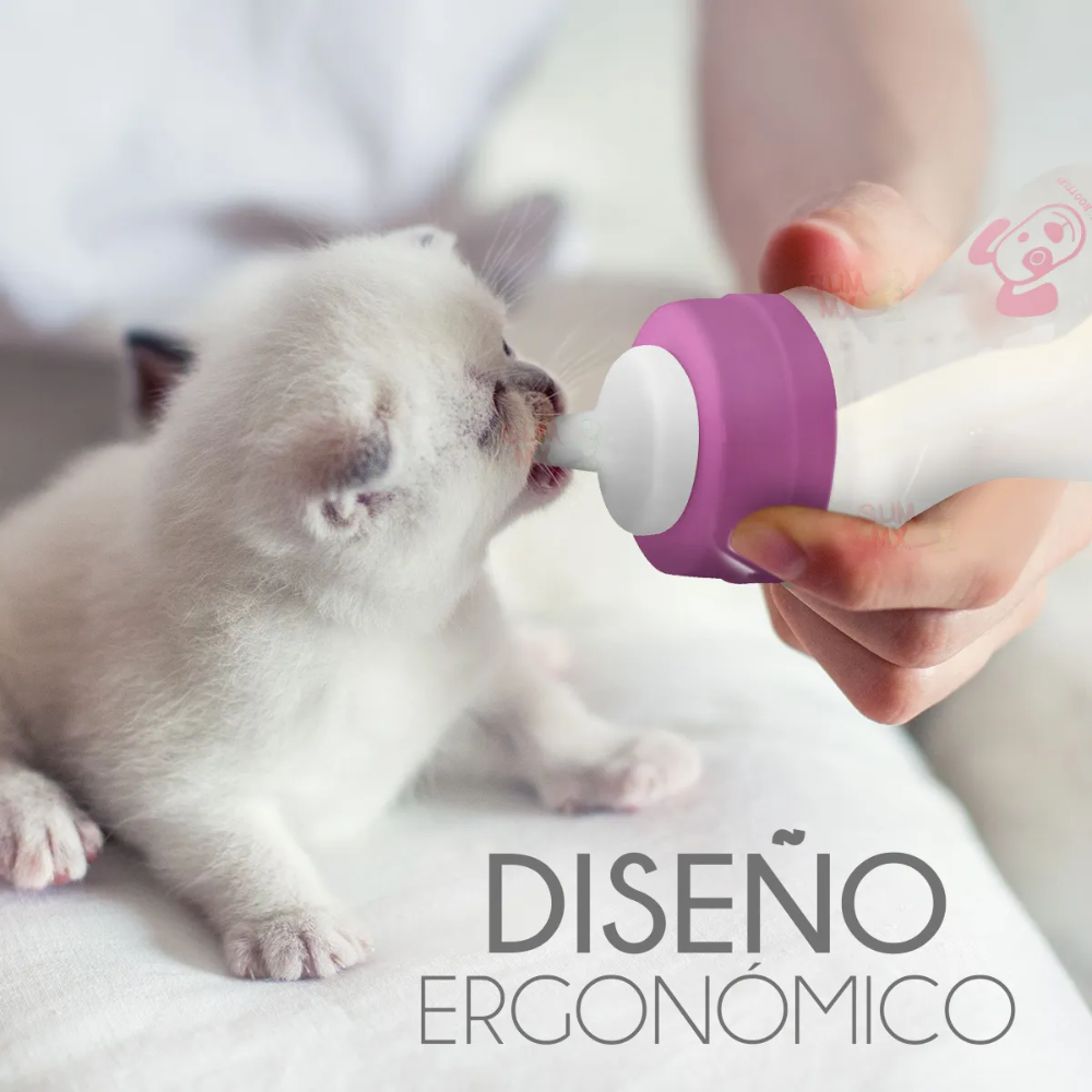Person feeding a kitten from a pink and white bottle with 'Diseón Ergonómico' text.