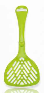 Green plastic spatula on a white background