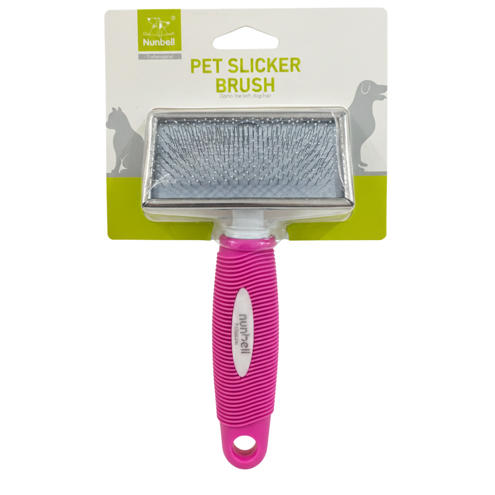 Pet slicker brush with pink handle on a white background