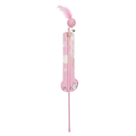 Pink toy with a fluffy tail on a white background