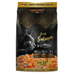 Leonardo cat food package with a black background, featuring a cat and salmon illustration.
