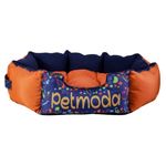 Pet bed with colorful design and 'petmoda' branding on a white background