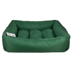 Green pet bed with a visible brand label on a white background