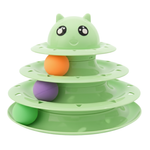 Green tiered toy with colorful balls on a white background