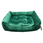 Green pet bed on a white background