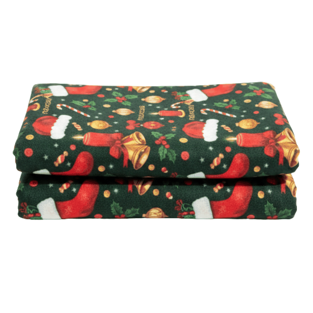 Folded fabric with Christmas pattern on a white background