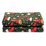 Folded fabric with Christmas pattern on a white background