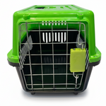 Green and black pet carrier with a green door on a white background